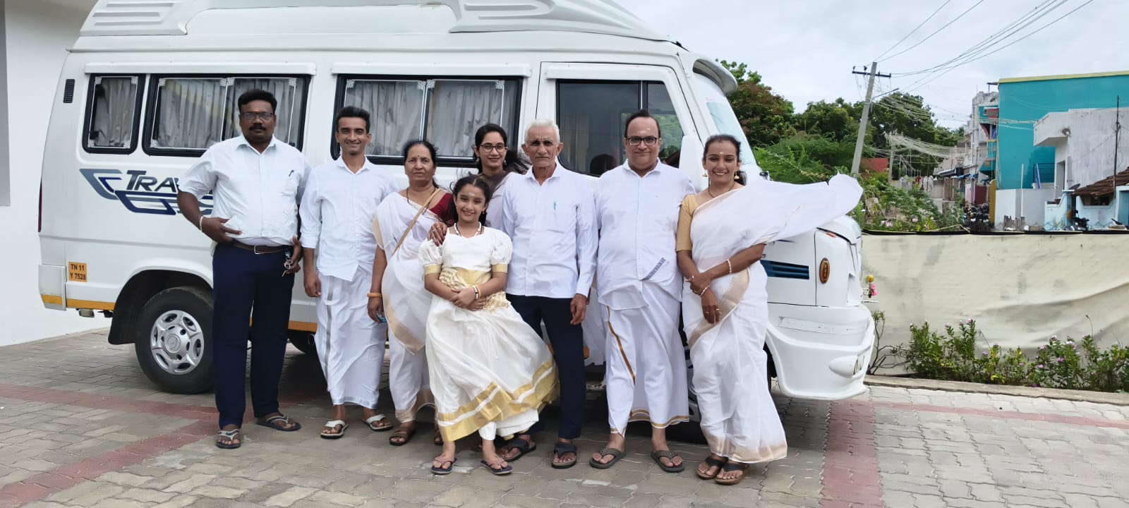 Group customers with Rithish Tours Tempo Traveller vehicle Madurai